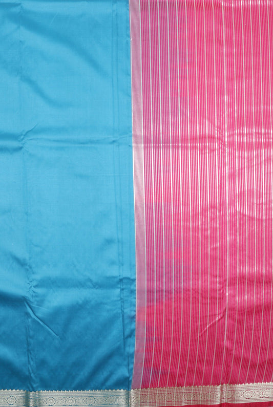 Elegant Weaves Turquoise and Pink Silk Saree with Zari Border