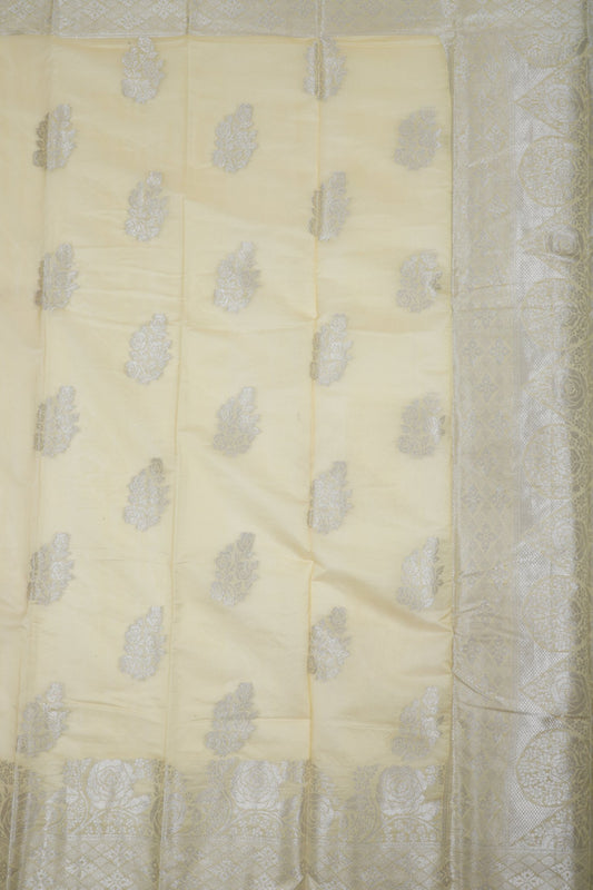 Elegant Weaves Light Yellow Banarasi Silk Saree with Silver Zari Work