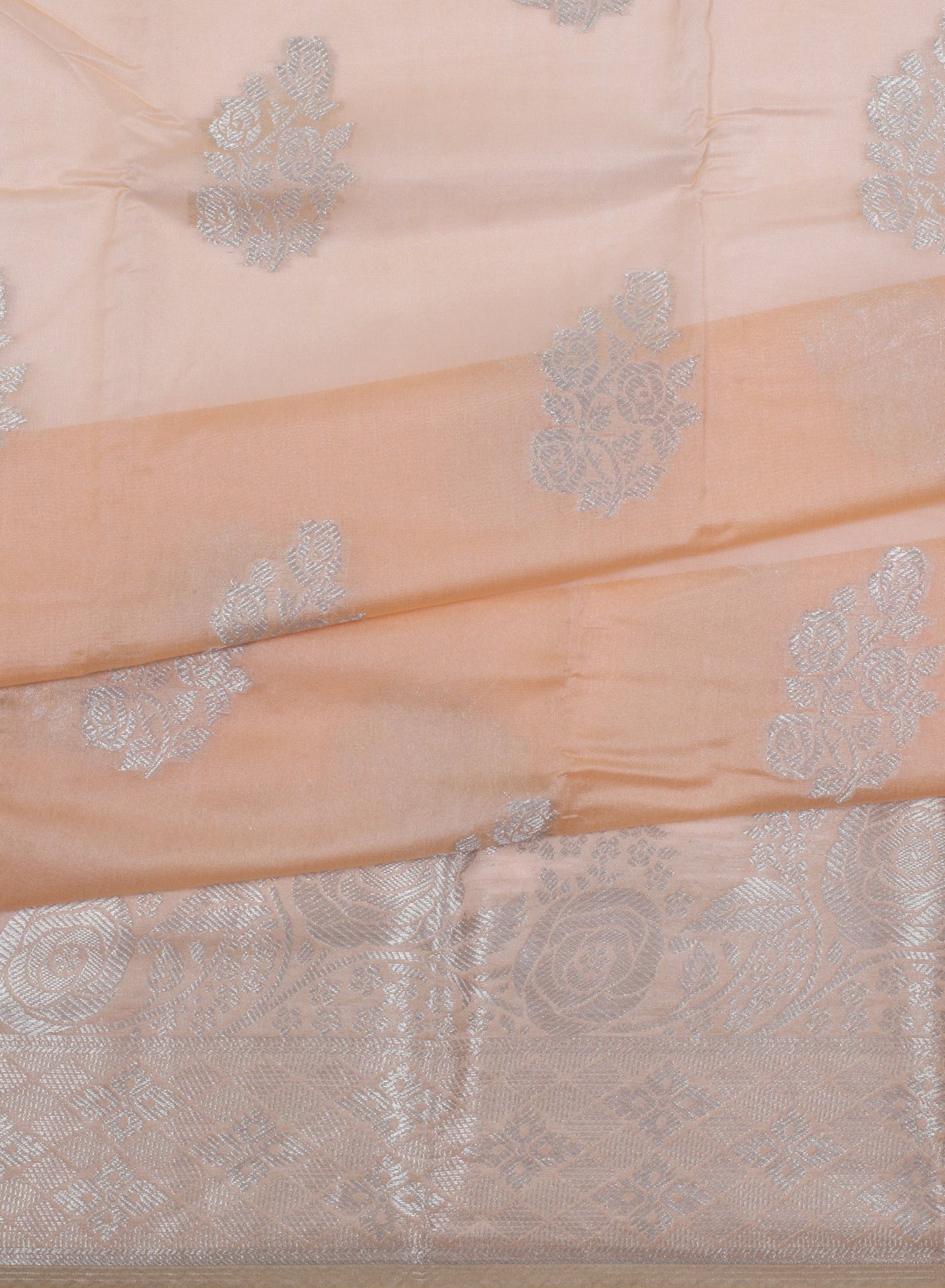 Peach Silk Saree with Silver Zari Floral Motifs