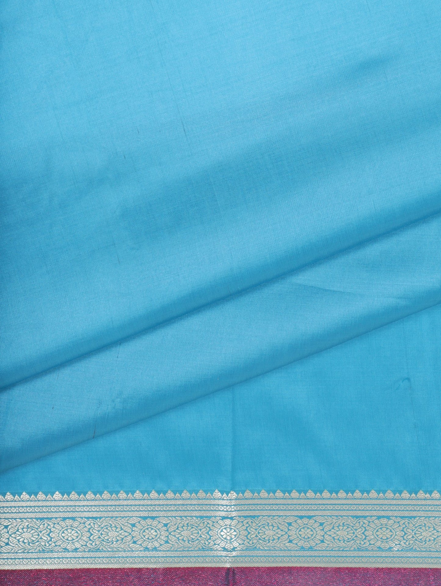 Elegant Weaves Turquoise and Pink Silk Saree with Zari Border